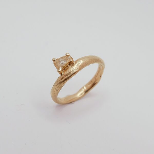 Soft wave ring with pear-cut yellow diamond