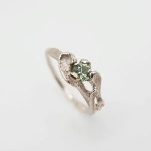 Unique organic ring with green/blue sapphire